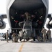 C-17 Globemaster III offload AH-64E Apaches in the USCENTCOM area of responsibility