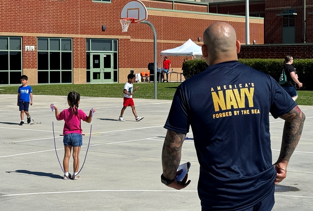 Serving country and community: HM-15 volunteers at Camp Allen Elementary field day