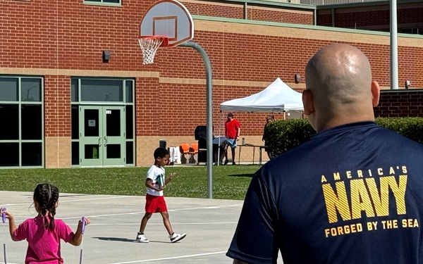 Serving country and community: HM-15 volunteers at Camp Allen Elementary field day