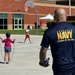 Serving country and community: HM-15 volunteers at Camp Allen Elementary field day