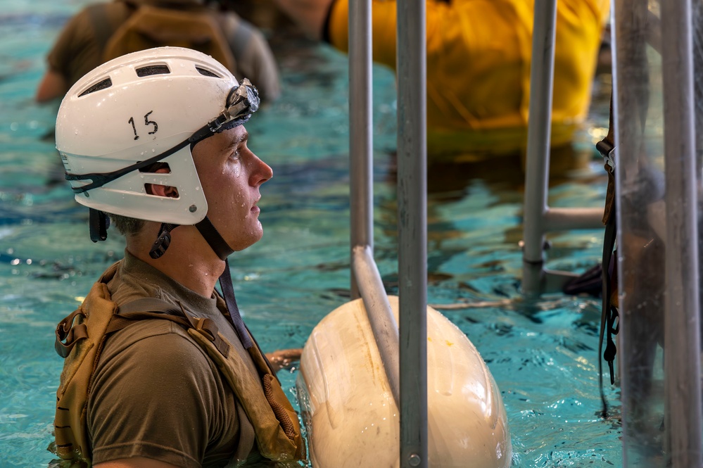Airmen undergo underwater egress training