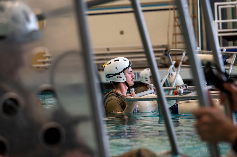 Airmen undergo underwater egress training