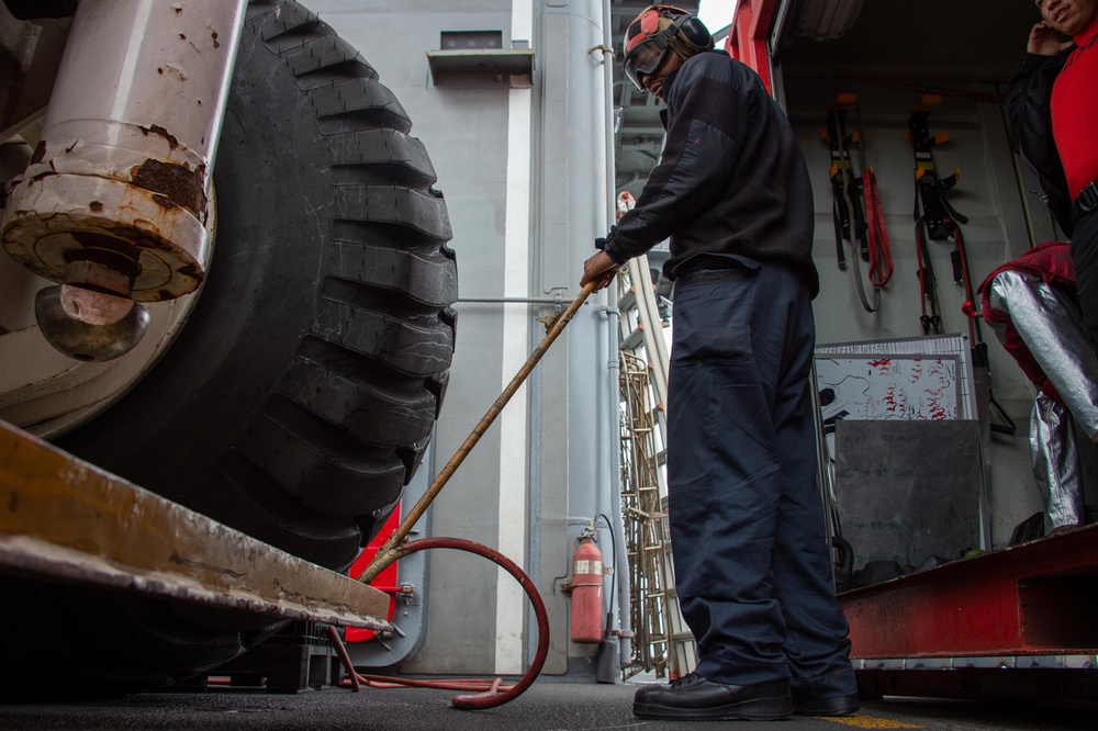 USS Carl Vinson (CVN 70) Sailor Conducts Preventative Maintenance