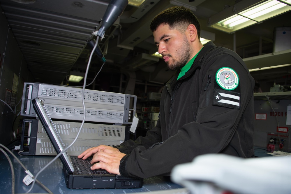 USS Carl Vinson (CVN 70) Sailor Calibrates Audio Analyzer