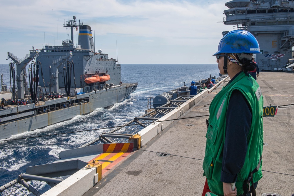 USS Ronald Reagan (CVN 76) conducts a fueling-at-sea and replenishment-at-sea with USNS Rappahannock (T-AO 204)