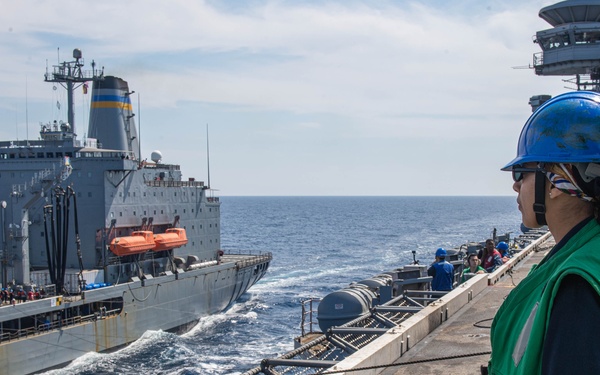 USS Ronald Reagan (CVN 76) conducts a fueling-at-sea and replenishment-at-sea with USNS Rappahannock (T-AO 204)