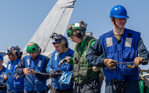 USS Ronald Reagan (CVN 76) conducts a fueling-at-sea and replenishment-at-sea with USNS Rappahannock (T-AO 204)