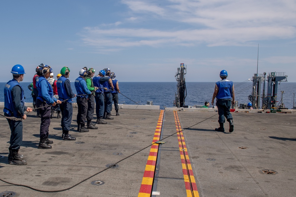 USS Ronald Reagan (CVN 76) conducts a fueling-at-sea and replenishment-at-sea with USNS Rappahannock (T-AO 204)