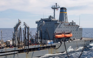 USS Ronald Reagan (CVN 76) conducts a fueling-at-sea and replenishment-at-sea with USNS Rappahannock (T-AO 204)