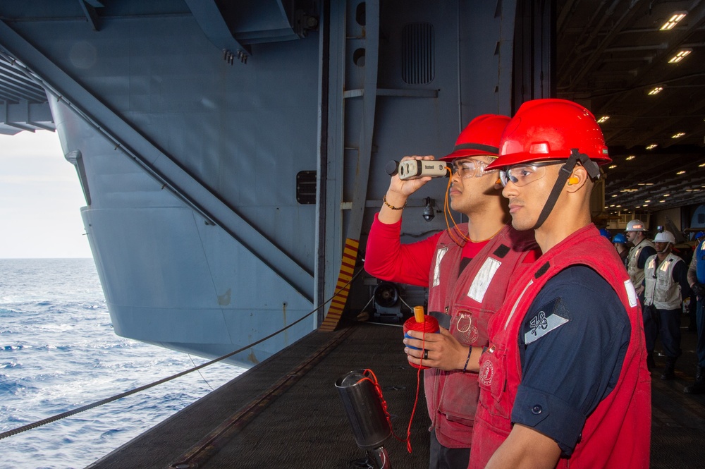 USS Ronald Reagan (CVN 76) conducts a fueling-at-sea and replenishment-at-sea with USNS Rappahannock (T-AO 204)