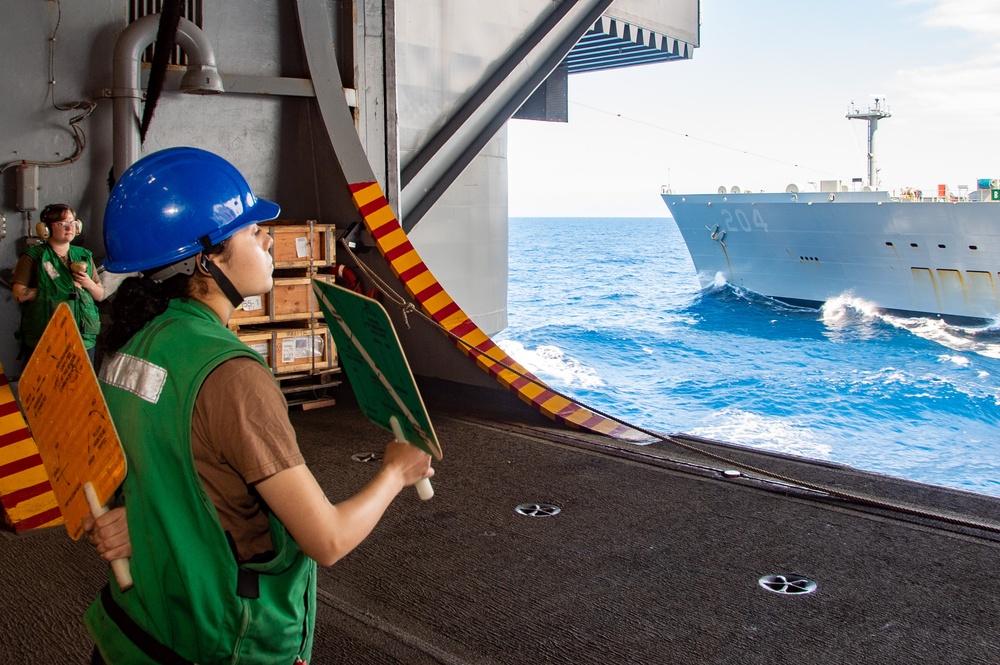 USS Ronald Reagan (CVN 76) conducts a fueling-at-sea and replenishment-at-sea with USNS Rappahannock (T-AO 204)