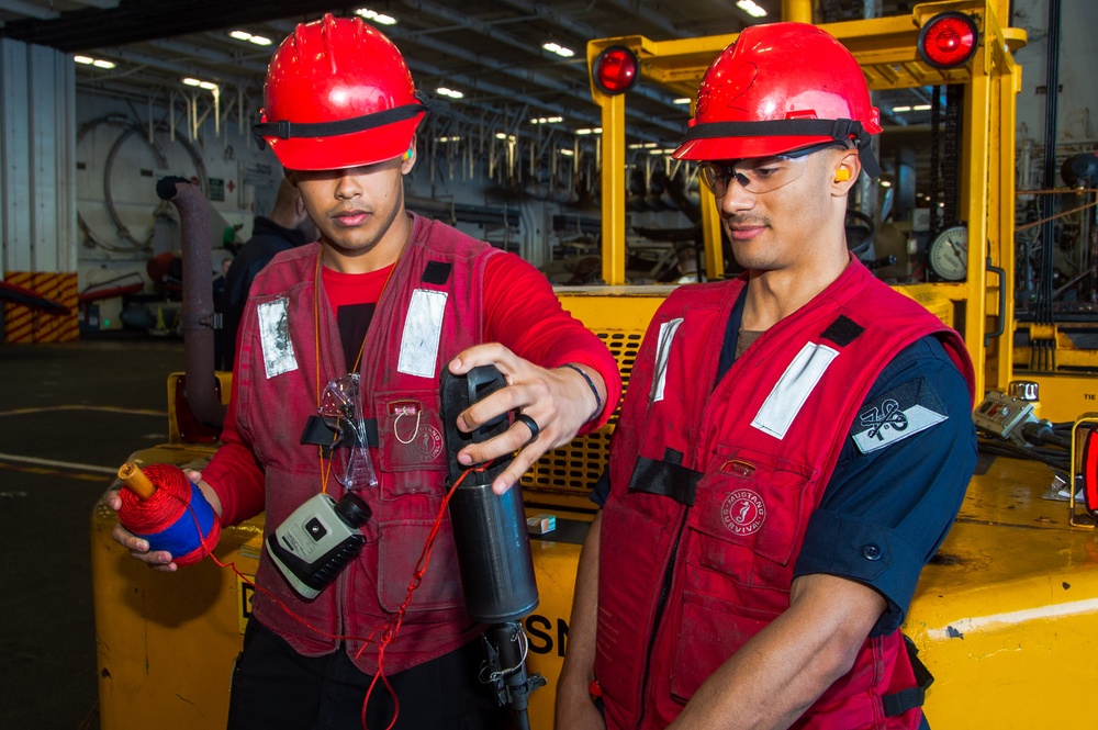 USS Ronald Reagan (CVN 76) conducts a fueling-at-sea and replenishment-at-sea with USNS Rappahannock (T-AO 204)