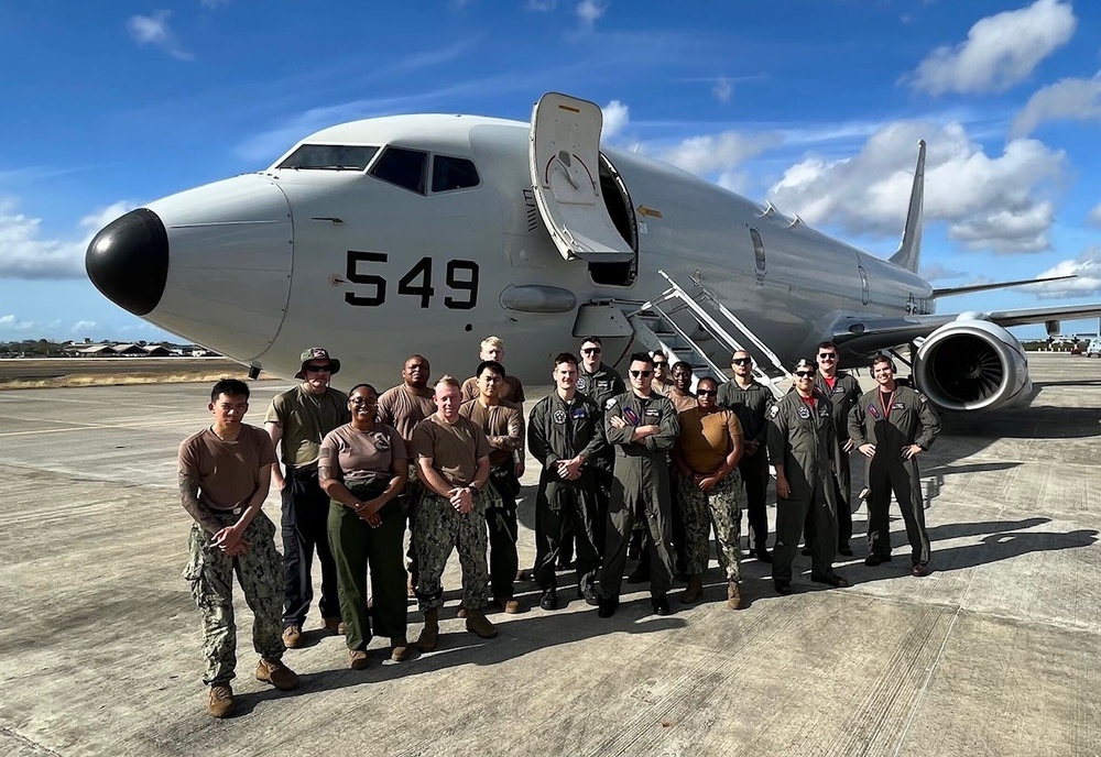 VP-10 Poses in front of P-8A Poseidon during Balikatan 2024