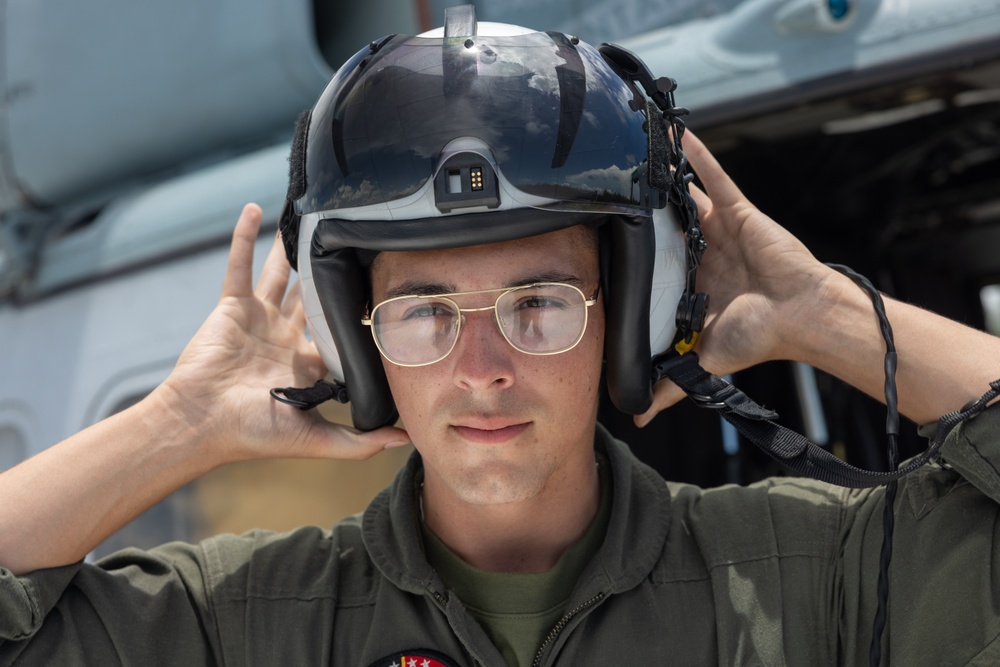 U.S. Marines and Sailors conduct simulated casualty evacuation operations during Distributed Aviation Operations Exercise 24
