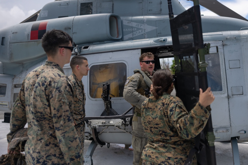 U.S. Marines and Sailors conduct simulated casualty evacuation operations during Distributed Aviation Operations Exercise 24