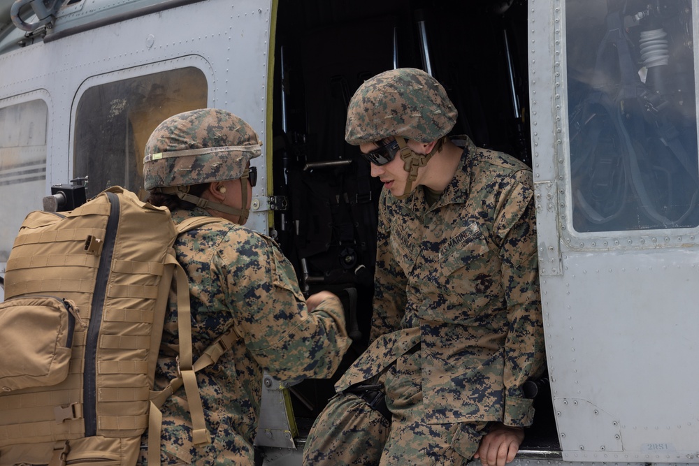 U.S. Marines and Sailors conduct simulated casualty evacuation operations during Distributed Aviation Operations Exercise 24