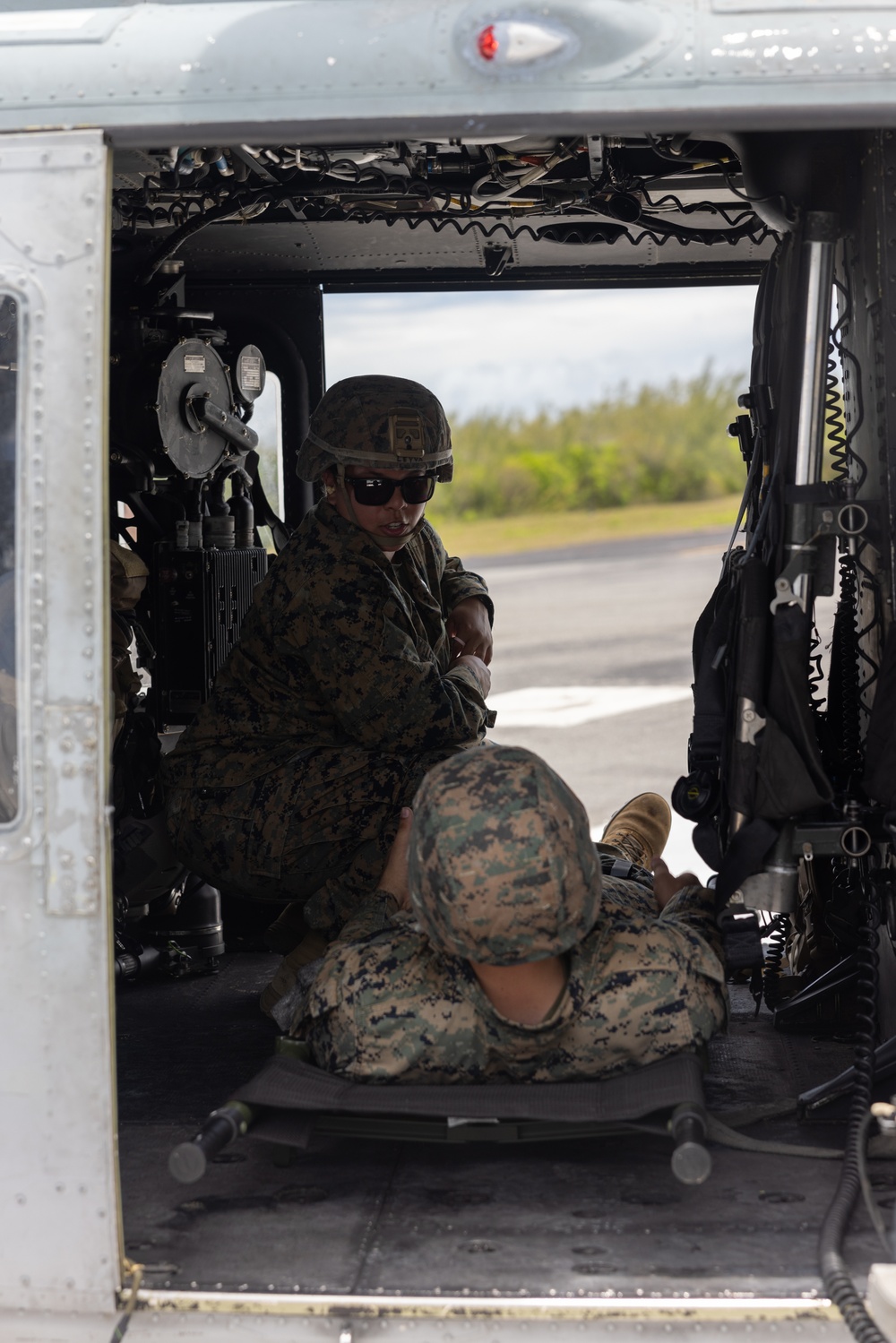 U.S. Marines and Sailors conduct simulated casualty evacuation operations during Distributed Aviation Operations Exercise 24
