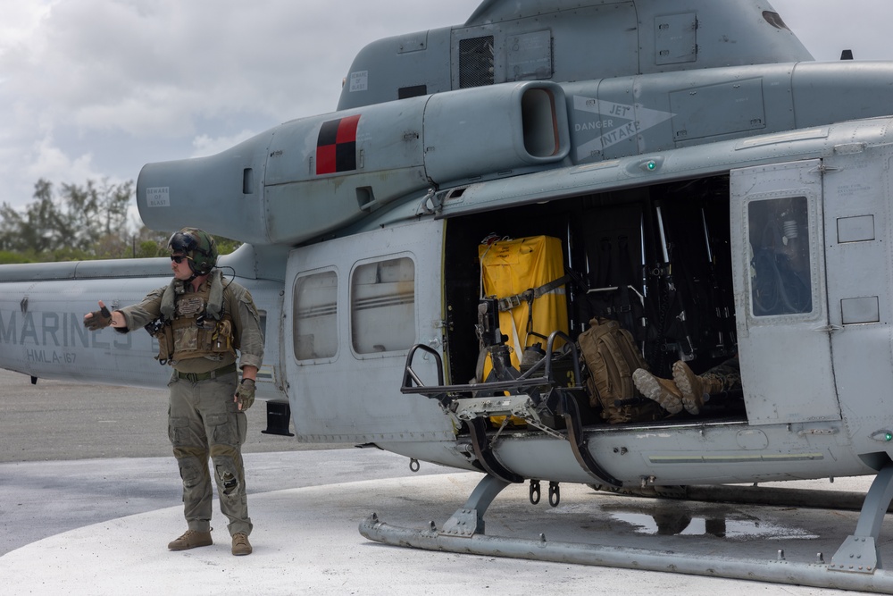 U.S. Marines and Sailors conduct simulated casualty evacuation operations during Distributed Aviation Operations Exercise 24
