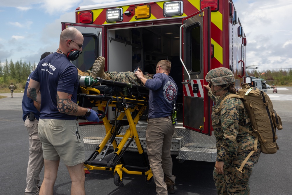 U.S. Marines and Sailors conduct simulated casualty evacuation operations during Distributed Aviation Operations Exercise 24