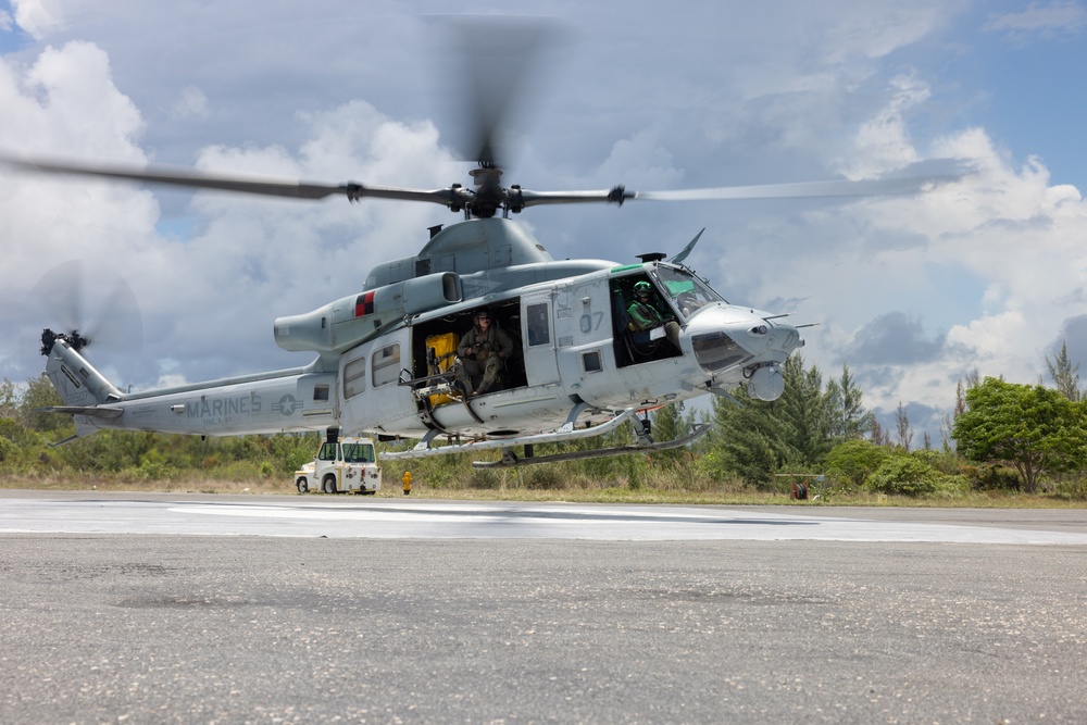 U.S. Marines with HMLA-167 train with U.S. Navy for casualty evacuation operations during Distributed Aviation Operations Exercise 24