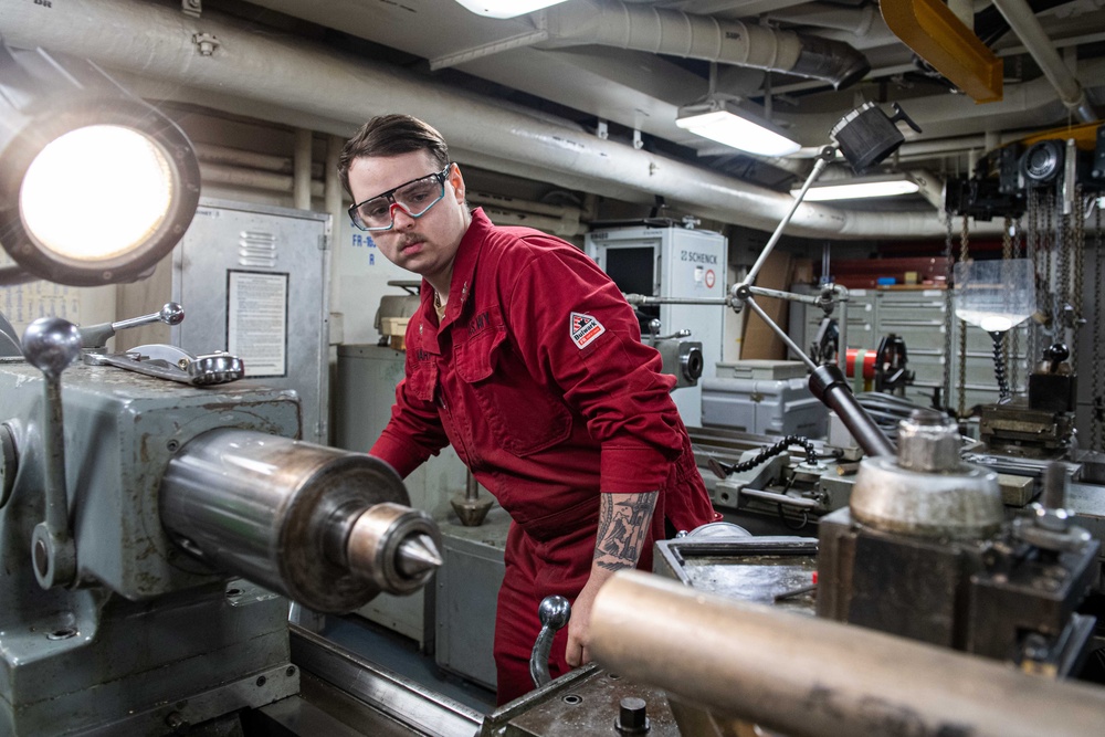 USS Ronald Reagan (CVN 76) Sailors fabricate parts in machine repair shop