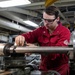 USS Ronald Reagan (CVN 76) Sailors fabricate parts in machine repair shop