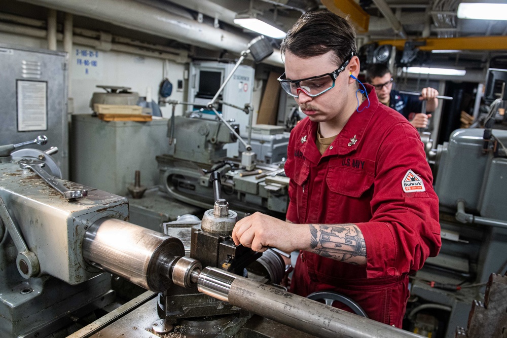 USS Ronald Reagan (CVN 76) Sailors fabricate parts in machine repair shop