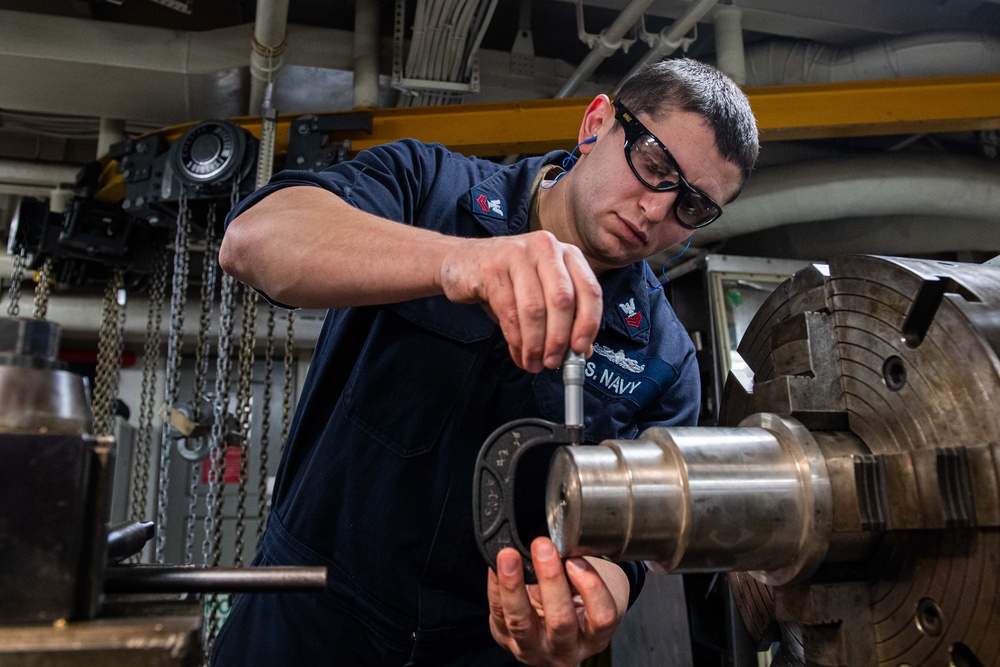 USS Ronald Reagan (CVN 76) Sailors fabricate parts in machine repair shop