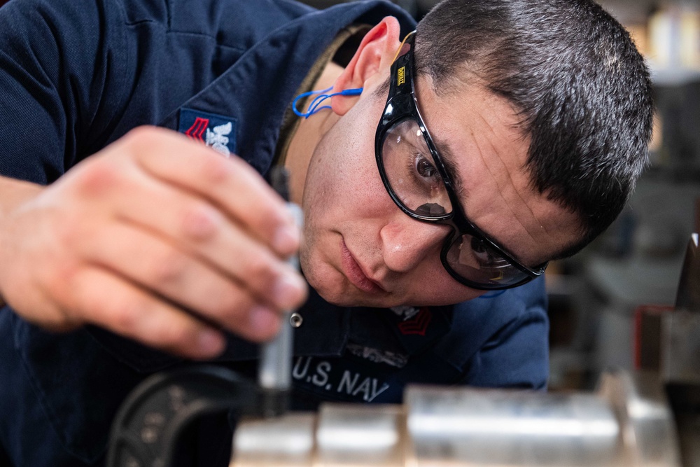 USS Ronald Reagan (CVN 76) Sailors fabricate parts in machine repair shop