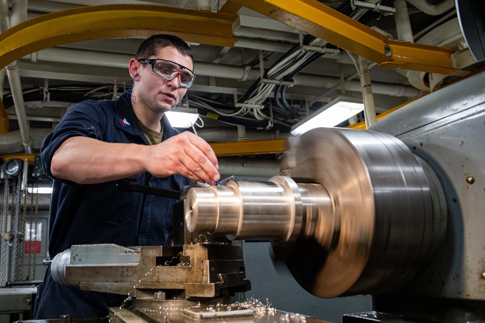 USS Ronald Reagan (CVN 76) Sailors fabricate parts in machine repair shop