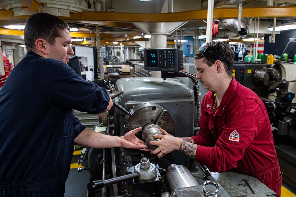 USS Ronald Reagan (CVN 76) Sailors fabricate parts in machine repair shop