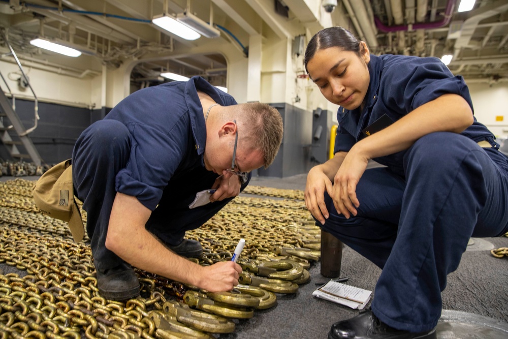 Midshipmen Perform Chain Maintenance Aboard USS Tripoli