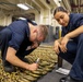 Midshipmen Perform Chain Maintenance Aboard USS Tripoli