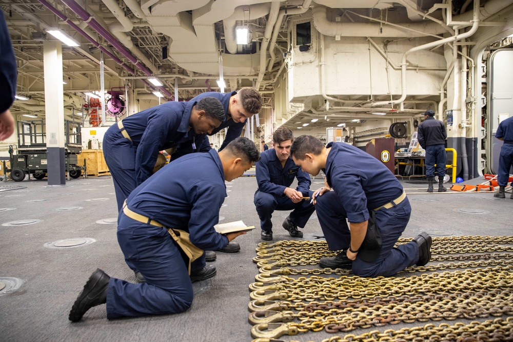 Midshipmen Perform Chain Maintenance Aboard USS Tripoli