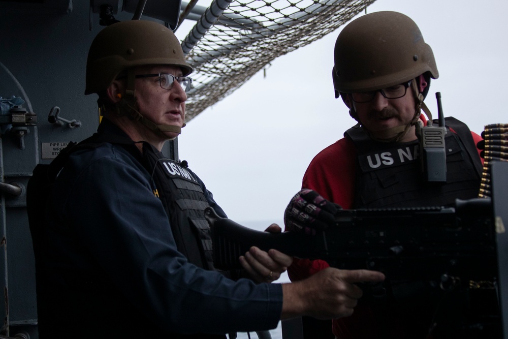 USS Tripoli CO, CMC participate in M240B gun shoot