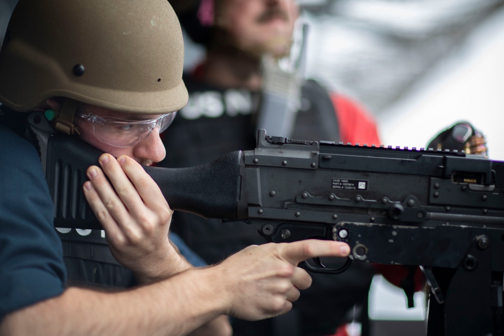 USS Tripoli CO, CMC participate in M240B gun shoot