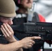 USS Tripoli CO, CMC participate in M240B gun shoot