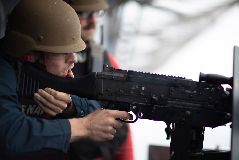 USS Tripoli CO, CMC participate in M240B gun shoot