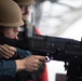 USS Tripoli CO, CMC participate in M240B gun shoot