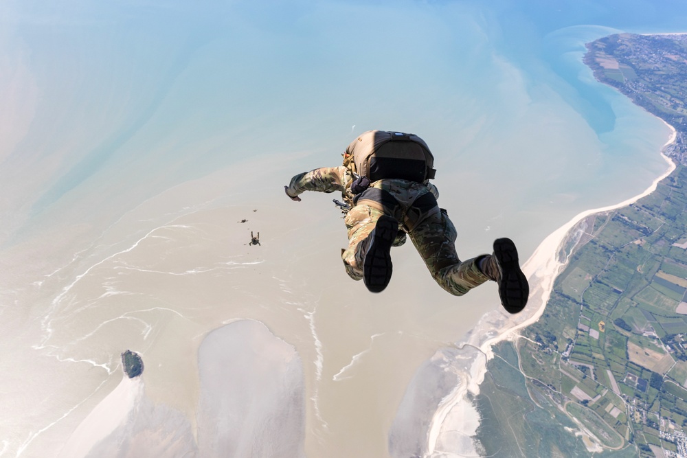 U.S. Air Force Special Tactics Airmen perform a freefall jump in honor of the 80th anniversary of D-Day