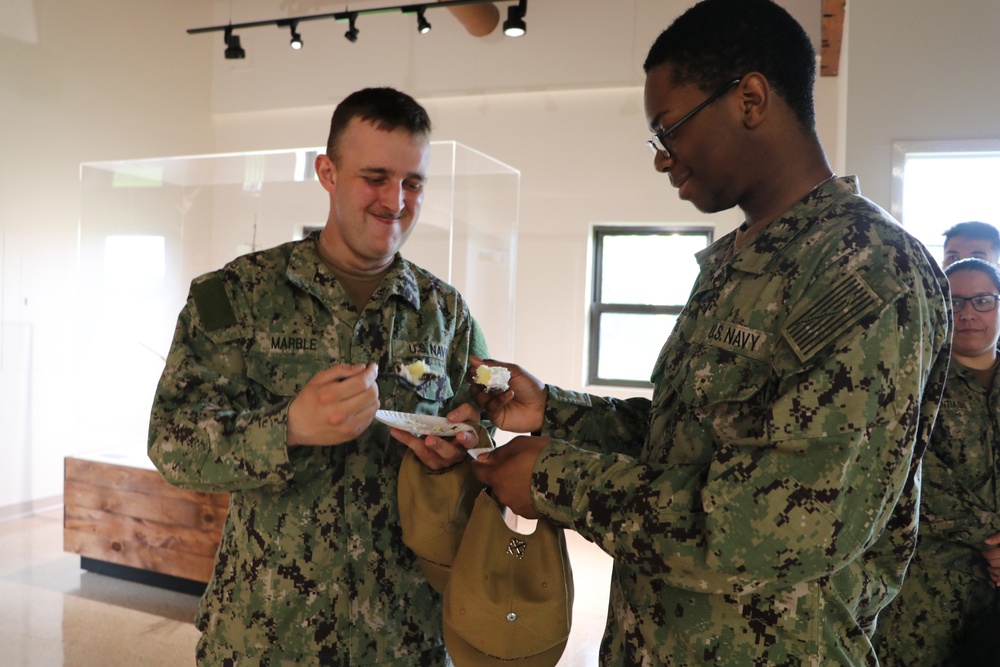 Sailors Enjoy Cake at Battle of Midway Commemoration