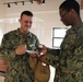 Sailors Enjoy Cake at Battle of Midway Commemoration