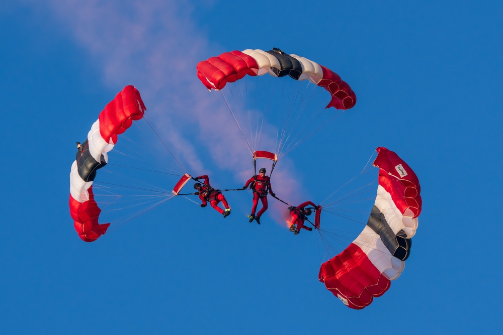 Soldiers from British Army Parachute Display Team jump onto Utah Beach in Normandy, France for D-Day commemoration ceremonies