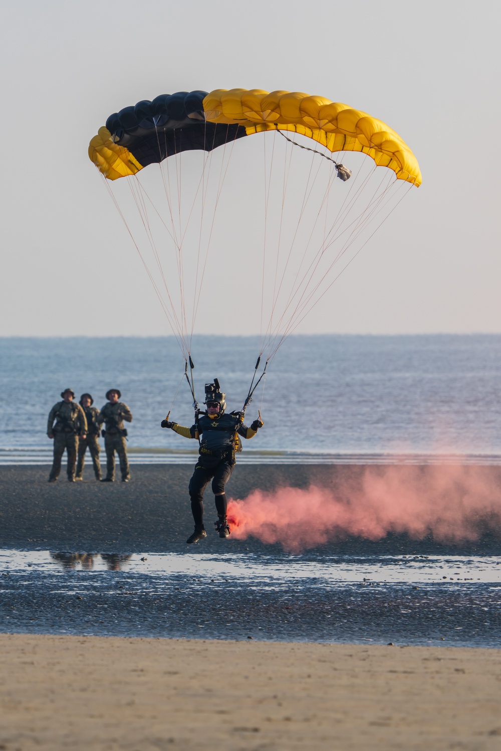 Soldiers from Army Golden Knights jump onto Utah Beach in Normandy, France for D-Day commemoration ceremonies