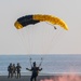 Soldiers from Army Golden Knights jump onto Utah Beach in Normandy, France for D-Day commemoration ceremonies