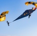 Soldiers from Army Golden Knights jump onto Utah Beach in Normandy, France for D-Day commemoration ceremonies