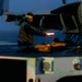 Aircraft Handlers Move Aircraft at Dawn