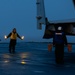 Aircraft Handlers Move Aircraft at Dawn