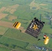 Soldiers from Army Golden Knights jump onto Utah Beach in Normandy, France for D-Day commemoration ceremonies