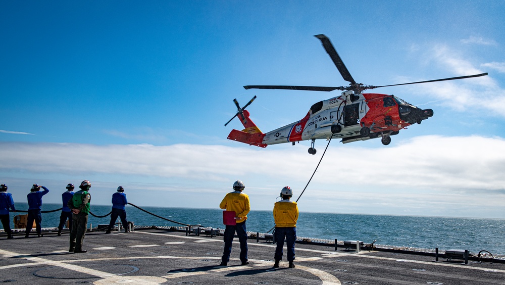 US Coast Guard Cutter Calhoun conducts in-flight refueling with Air Station Elizabeth City